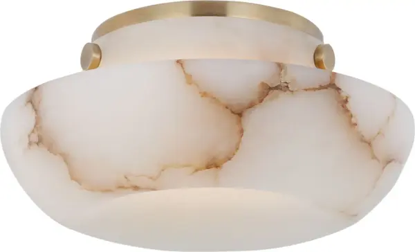 The Cappello 6" flush mount combines natural alabaster with antique-burnished brass for a sophisticated, space-saving lighting solution. Perfect for low ceilings and intimate spaces requiring ambient illumination.