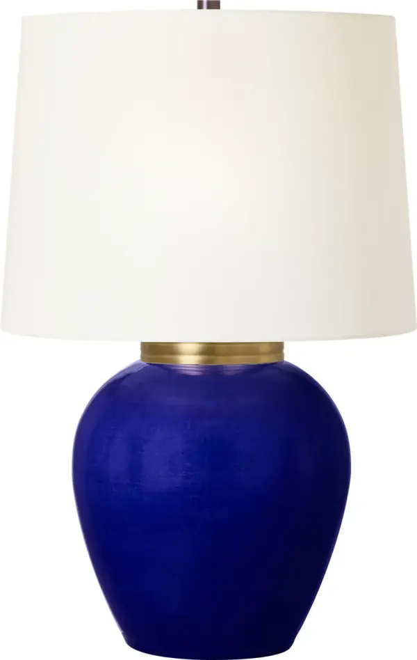 The Lilian Medium Table Lamp features stunning crystal construction with a distinctive cobalt blue finish, bringing sophisticated color and light-refracting beauty to any space. Perfect for adding a jewel-toned accent. - alternate view
