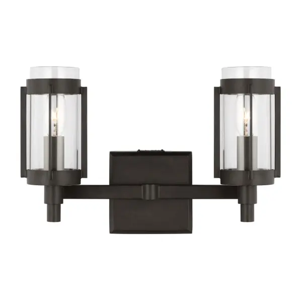 The Flynn vanity light delivers authentic mid-century style with geometric vertical tubes and an Aged Iron finish. Its compact 13.25" width makes it ideal for smaller vanities while providing quality task lighting.