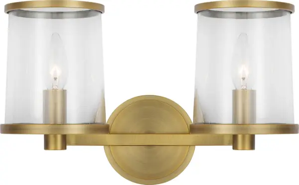 The Reynolds Medium Vanity combines refined candelabra-style elegance with clear glass shades and polished metal rings. Its Time Worn Brass finish adds warmth while maintaining versatility across modern and traditional spaces. - alternate view