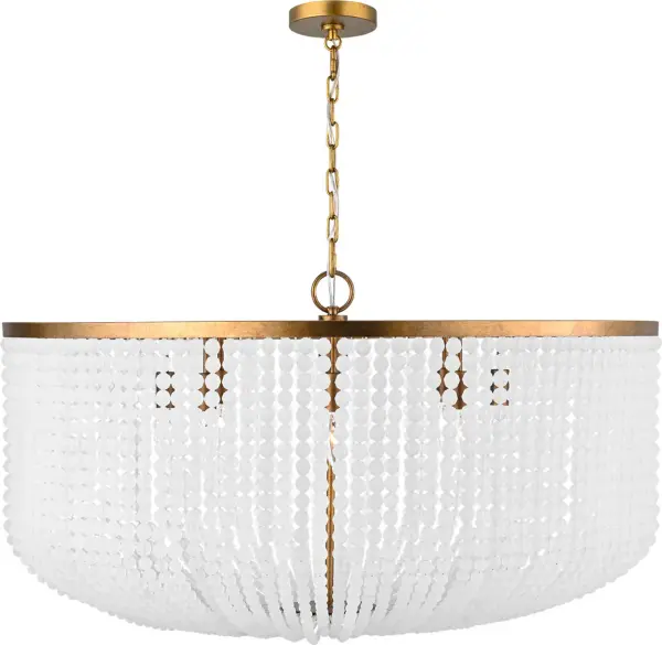 The Bellecour 36" Chandelier brings architectural grandeur inspired by 1930s Parisian salons to large-scale interiors. Hand-strung crystal beads create diffused, candle-like radiance while the vintage gilded frame adds warmth and sophistication.