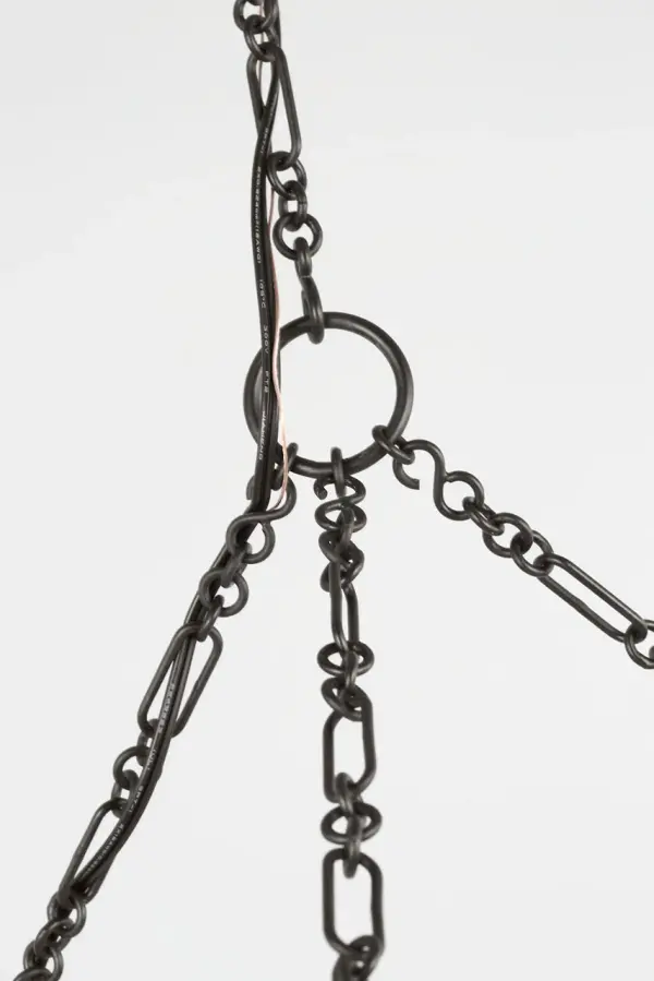 The Lenoir 36" Chandelier commands attention with its architectural inverted bowl form and striking contrast between matte aged iron exterior and luminous gilded core. Inspired by 1930s French design, it delivers sophisticated presence. - alternate view