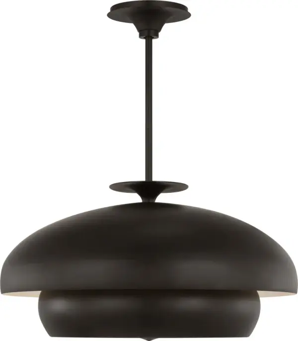 The Solene 24" Pendant transforms mid-scale spaces with its nested dome silhouette and hand-patinated aged iron finish. Light escapes in a soft elliptical halo, creating architectural clarity with intimate warmth—perfect for modern dining rooms.