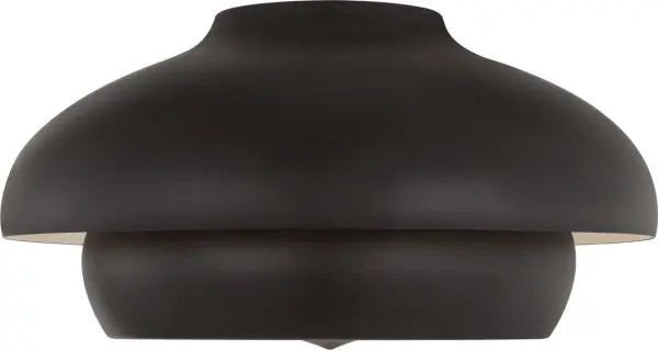The Solene 18" Flush Mount combines architectural sophistication with practical design for lower ceilings. Its tiered domed silhouette in aged iron creates layered, diffused lighting while the hand-finished interior adds warmth.