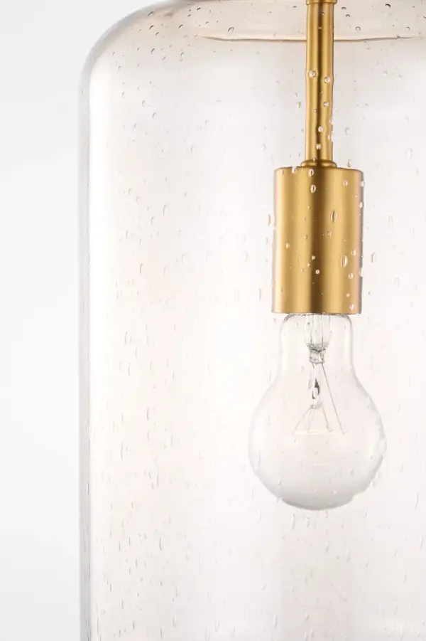 The Nodier 17" Pendant combines mouth-blown seeded glass with hand-finished burnished brass for a sophisticated Scandinavian aesthetic. Perfect alone or in multiples, it balances artisan craftsmanship with modern simplicity. - alternate view