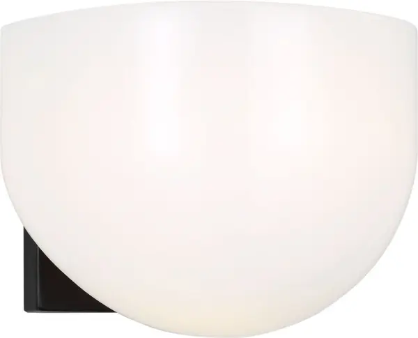 The Cheverny wall sconce by Christiane Lemieux beautifully blends 1940s French and Italian elegance with modern versatility. Its compact 6.5-inch profile and aged iron finish make it ideal for intimate spaces.