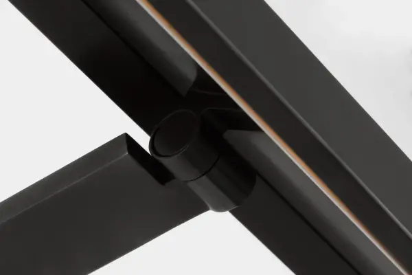 The Trave 18 Picture Light combines architectural form with functional elegance. Its compact 18-inch design with integrated LED and pivoting shade makes it ideal for accenting smaller wall art in powder rooms, hallways, and reading nooks. - alternate view