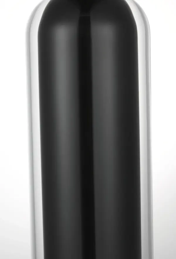 The Tala 15 Pendant by Mick De Giulio masterfully combines clear glass layered over spun bronze metal to create a subtle floating effect. Its minimalist design and soft curves offer versatile styling—stunning solo or in clustered arrangements. - alternate view