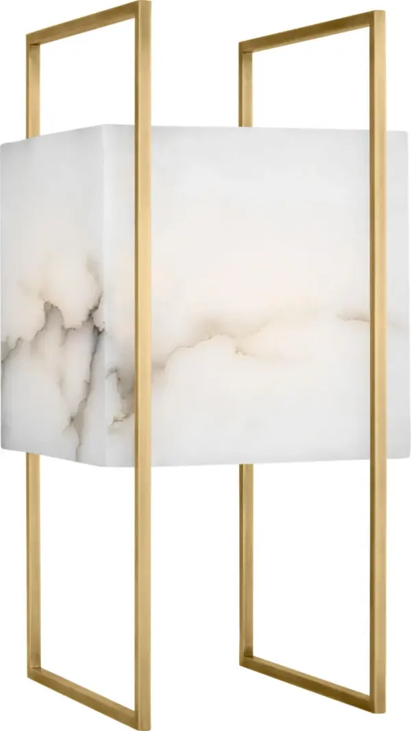 The Aloft Cordless Table Lamp by Mick De Giulio combines modern minimalist design with practical cordless functionality. Its luminous alabaster shade and hand-rubbed antique brass finish create a sophisticated focal point.