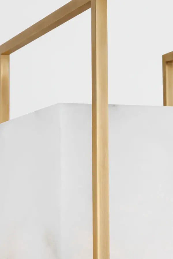 The Aloft Cordless Table Lamp by Mick De Giulio combines modern minimalist design with practical cordless functionality. Its luminous alabaster shade and hand-rubbed antique brass finish create a sophisticated focal point. - alternate view