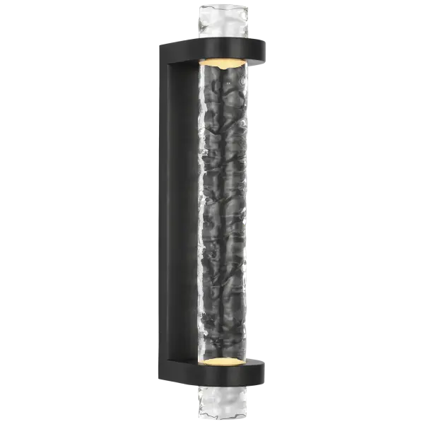 The Theron 15" Linear Bath Sconce combines classic bronze finish with unique clear wavy glass for sophisticated bathroom lighting. Its linear design provides even illumination ideal for vanity areas. - alternate view