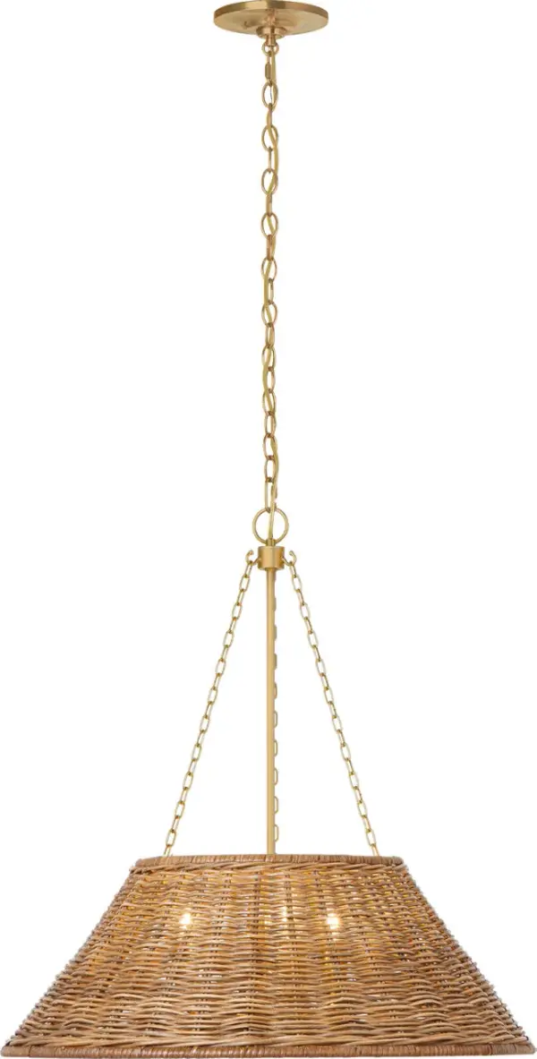 The Corinne 24" pendant brings natural texture and sophisticated coastal style to any space. Its handwoven wicker shade paired with soft brass hardware creates warm, filtered light perfect for dining and gathering areas.