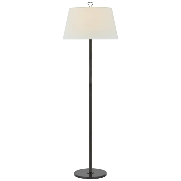 The Griffin Large Floor Lamp combines traditional bronze metalwork with luxurious chocolate leather detailing and a classic linen shade. This substantial piece offers both ambient lighting and decorative presence.