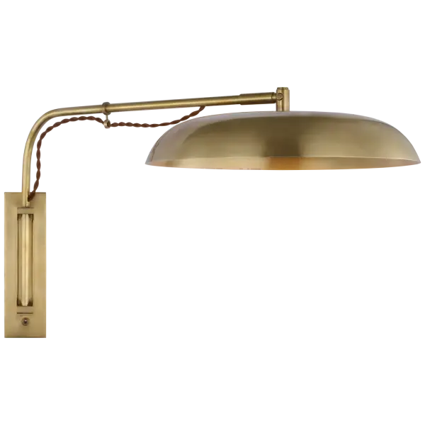 The Cyrus Medium Wall Light combines functional articulation with timeless brass styling. Its adjustable arm and white glass shade make it ideal for task lighting in bedrooms, offices, or reading nooks.