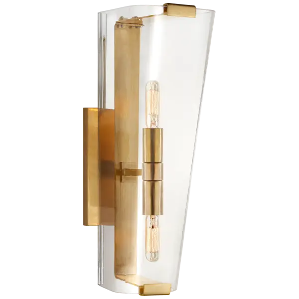 Elegant Single Sconce with Timeless Brass Finish and Clear Glass Shade