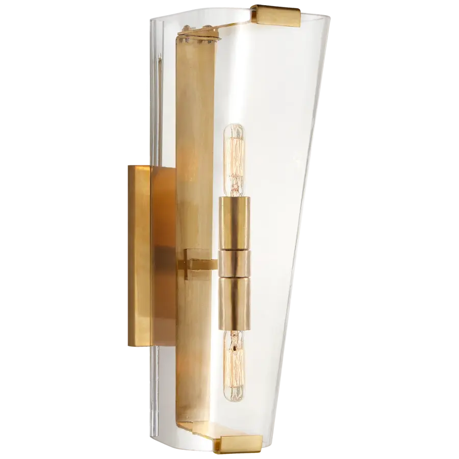 Elegant Single Sconce with Timeless Brass Finish and Clear Glass Shade