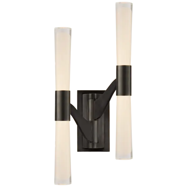 The Brenta Large Double Articulating Sconce combines functional flexibility with elegant design. Its adjustable arms allow precise light direction, while the bronze finish and white glass shade create a sophisticated look.