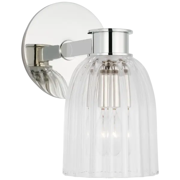 The Asalea Single Sconce combines classic elegance with versatile styling. Its polished nickel finish and clear glass shade create a refined look that complements both traditional and contemporary interiors.