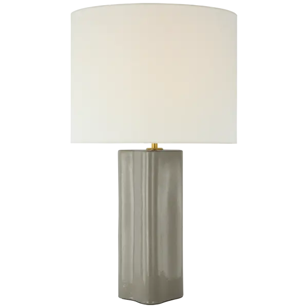 The Mishca Large Table Lamp combines sophisticated scale with a soft shellish gray ceramic base and natural linen shade. Its generous proportions and neutral palette make it ideal for anchoring living spaces or flanking beds.