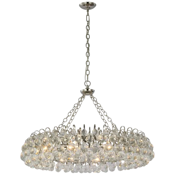 The Bellvale Large Ring Chandelier combines contemporary geometry with timeless crystal elegance. Its polished nickel finish and substantial size make it a statement piece for grand dining rooms and entryways.