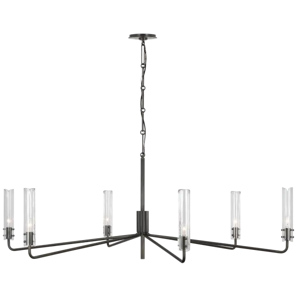 The Casoria Grande Chandelier combines traditional craftsmanship with clear glass elements, creating a sophisticated focal point. Its bronze finish and substantial scale make it ideal for formal dining rooms and grand entryways.