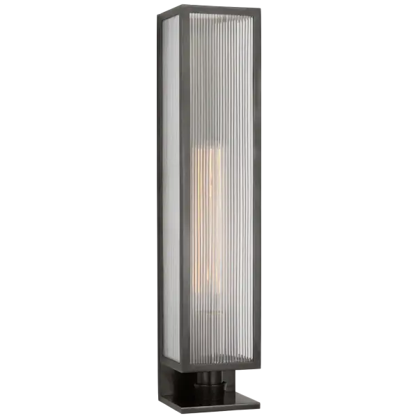 The York 24" box sconce delivers commanding scale and classic design with its bronze finish and clear ribbed glass. Perfect for spaces needing substantial wall lighting with traditional character.