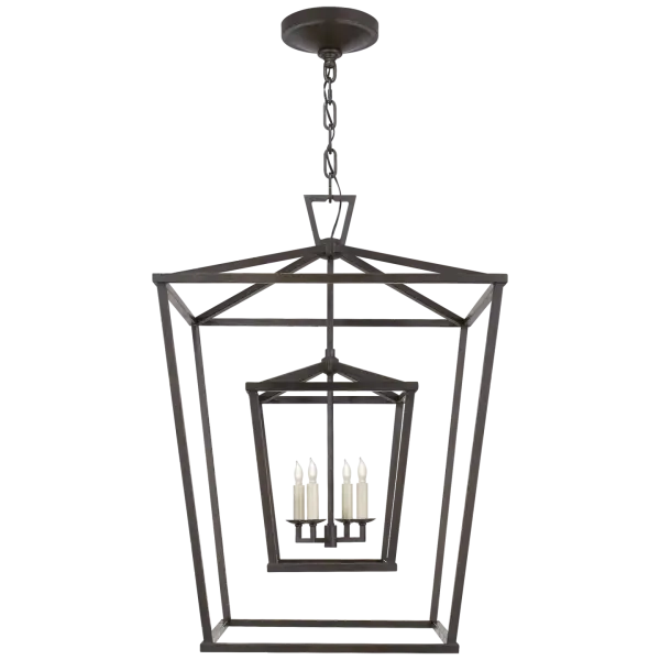 The Darlana Large Double Cage Lantern brings architectural elegance to grand spaces with its distinctive two-tier cage design in aged iron. Perfect for making a statement in foyers and dining rooms.