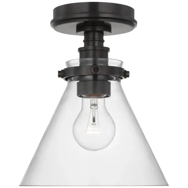 The Parkington 9" flush mount combines traditional bronze warmth with a clean conical glass shade, making it ideal for smaller spaces requiring low-profile lighting with timeless appeal.
