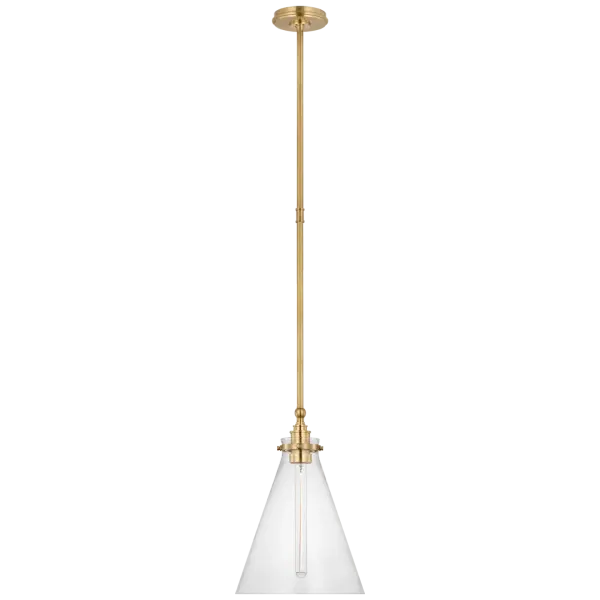 The Parkington pendant combines timeless conical design with antique-burnished brass and clear glass for versatile elegance. At 11" wide, it's perfectly scaled for kitchen islands, breakfast nooks, and smaller spaces.