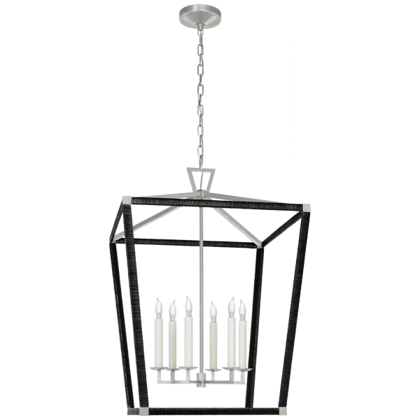 The Darlana XL combines sophisticated polished nickel framing with handwoven black rattan for a striking oversized lantern. Perfect for grand entryways and dining rooms requiring dramatic vertical presence.