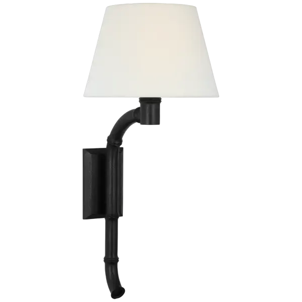 The Alana sconce features a graceful 27-inch curved tail design in French Rust finish, paired with a soft linen shade. This transitional piece adds sophisticated ambient lighting with European-inspired charm.