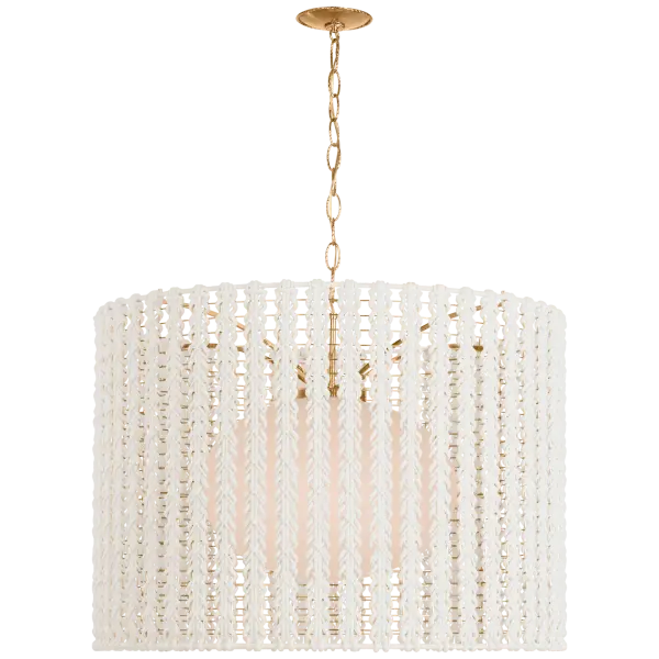 The Catania 40" pendant combines warm antique brass with handcrafted cream braided rope for a sophisticated coastal aesthetic. Its substantial size makes it perfect for large dining spaces or grand foyers.