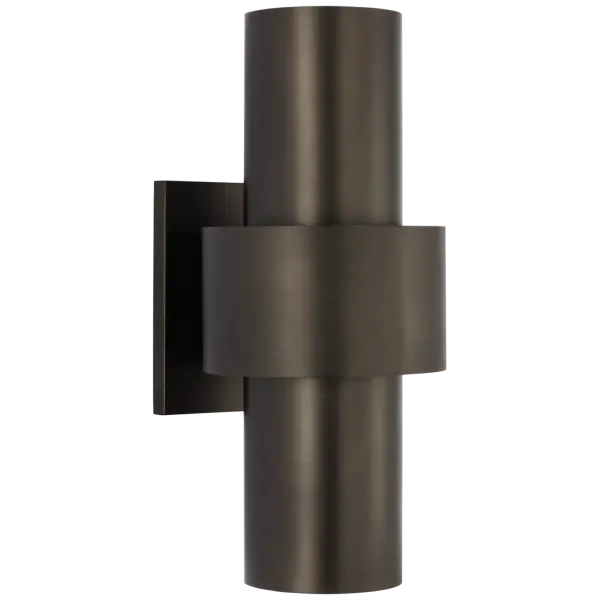 The Chalmette Medium Sconce features a distinctive layered metal design in an aged iron finish, offering architectural interest and warm ambient lighting. Perfect for transitional spaces seeking character.