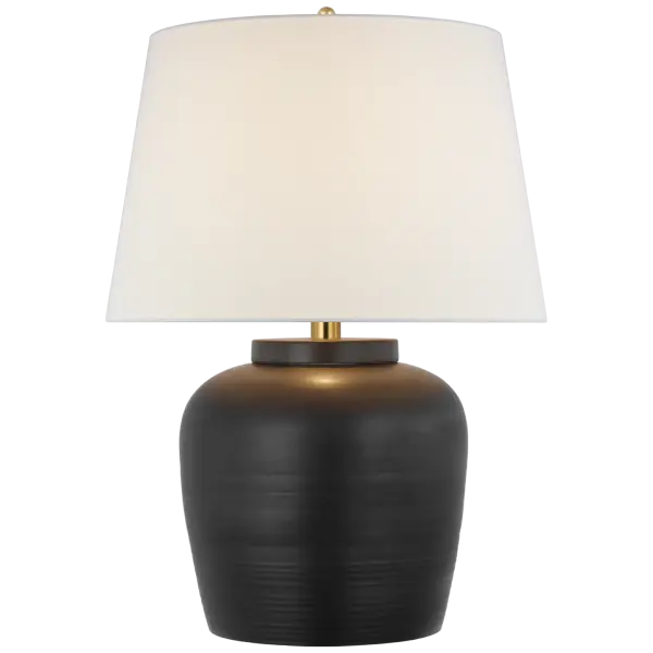 The Nora Medium Table Lamp combines timeless design with contemporary appeal. Its matte black finish and linen shade create a sophisticated look that works in both residential and commercial settings.