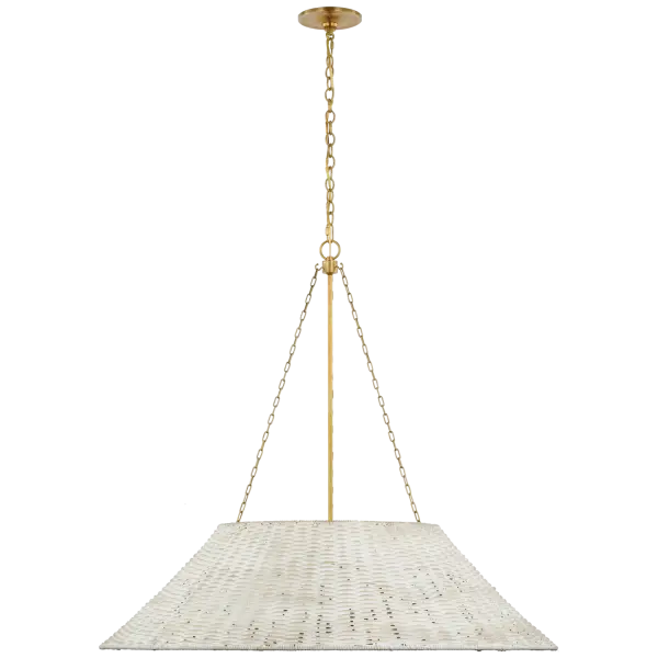 The Corinne Extra Large pendant combines natural white wicker weaving with refined soft brass hardware for a sophisticated coastal aesthetic. Its generous scale makes it perfect for anchoring large dining spaces or open-concept areas.
