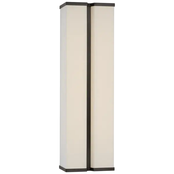 The Vernet sconce combines classic bronze metalwork with a soft linen shade, creating sophisticated ambient lighting. At 18" tall, it provides substantial presence while maintaining refined proportions for versatile placement.