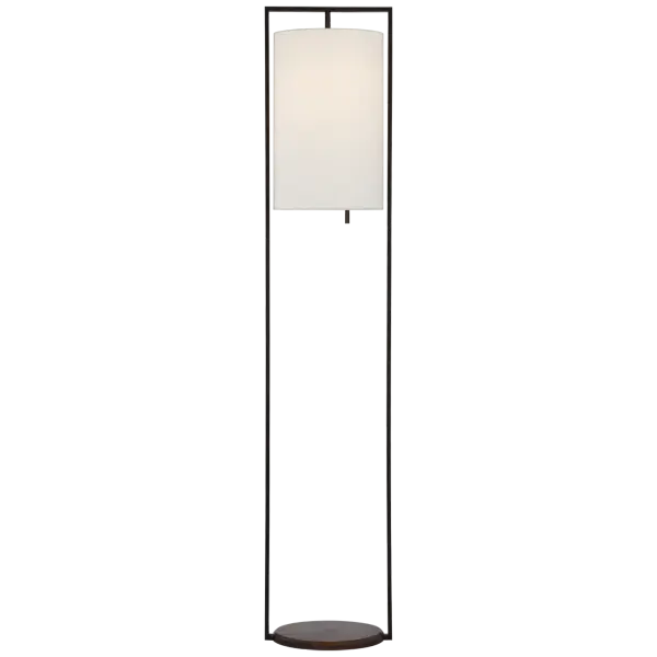 The Zenz Medium Floor Lamp combines warm iron metalwork with dark walnut wood accents, topped with a classic linen shade. This transitional design bridges traditional craftsmanship with contemporary sensibility.