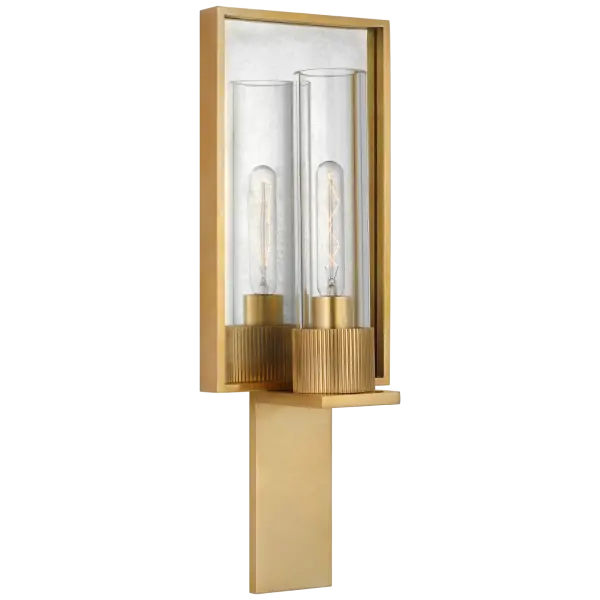 The Beza Single Reflector Sconce combines antique brass and mirror finishes with clear glass for a sophisticated look. Its reflector design amplifies light beautifully, making it ideal for vanities and accent lighting.