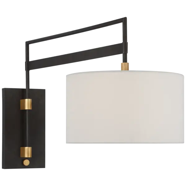 The Gael Large Wall Light combines warm iron and antique brass finishes with a classic linen shade, offering adjustable articulation for task or ambient lighting. Its transitional design bridges traditional and industrial aesthetics.