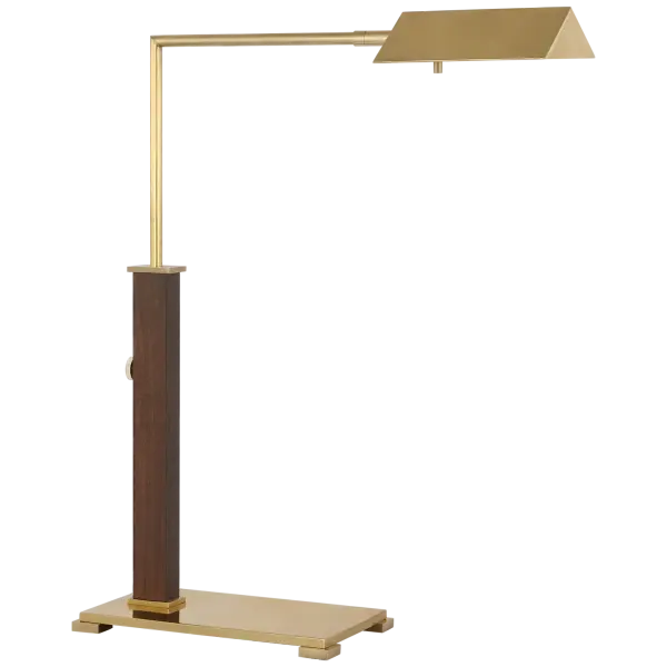 The Copse Medium Pharmacy Desk Lamp combines traditional pharmacy styling with refined materials. Antique brass paired with dark walnut creates a sophisticated look perfect for task lighting in home offices and reading spaces.