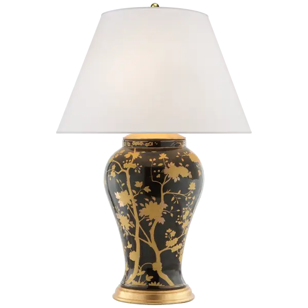 The Gable Table Lamp combines sophisticated black and gold porcelain with a refined silk shade, creating a transitional piece that bridges traditional elegance and contemporary style. Perfect for adding refined ambiance.