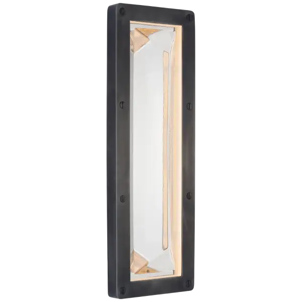 The Rolland sconce combines classic bronze finish with clear glass for versatile wall lighting. At 16 inches, it provides substantial presence while maintaining refined proportions suitable for various interior styles.