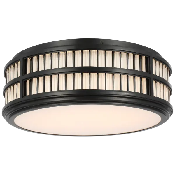 The Perren 18" flush mount combines contemporary glass rod design with warm bronze metalwork, creating a sophisticated lighting solution perfect for spaces with standard ceiling heights.