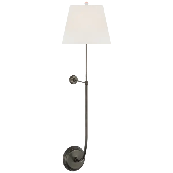 The Wyatt sconce makes a bold vertical statement with its impressive 39-inch height and elegant linen shade. The bronze finish adds warmth while the substantial scale creates dramatic impact in larger spaces.