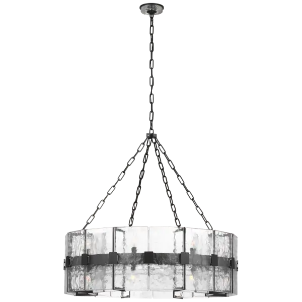 The Solera 37" Barrel Chandelier makes a bold statement with its generous proportions and distinctive clear wavy glass panels. The bronze finish provides warmth while the textured glass creates beautiful light diffusion and visual interest.