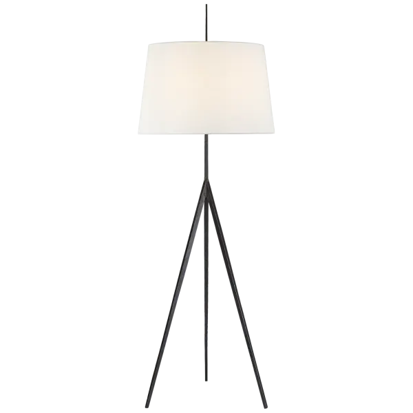 The Triad floor lamp showcases exceptional hand-forged craftsmanship in aged iron, paired with a classic linen shade. Its artisanal metalwork and traditional silhouette bring warmth and character to any space. - alternate view