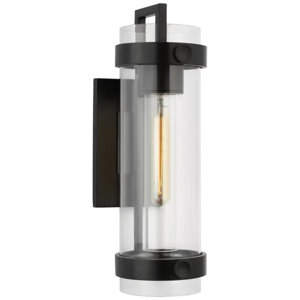 The Kears Small Wall Light combines traditional craftsmanship with versatile styling. Its aged iron finish and clear glass shade create warm, inviting illumination perfect for intimate spaces and transitional interiors.