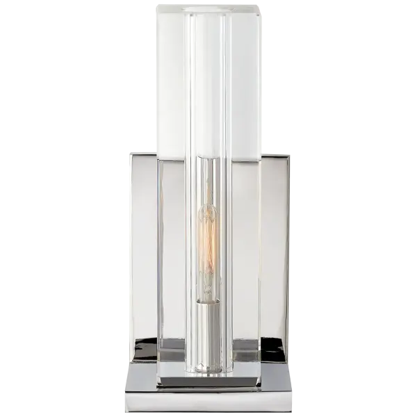 The Ambar Tall Wall Light combines sparkling crystal elements with polished nickel hardware for a sophisticated look. Its vertical design adds height and elegance to any space, making it ideal for bathrooms and hallways.