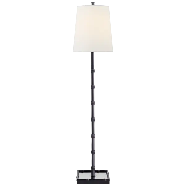 The Grenol Buffet Lamp combines traditional bronze metalwork with a refined linen shade, perfect for adding sophisticated ambient lighting to dining rooms and living spaces. Its buffet-height design makes it ideal for console tables and sideboards.