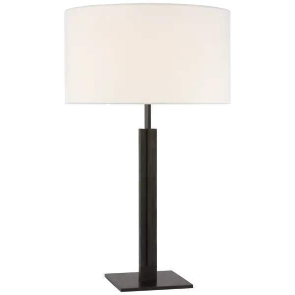 The Serre Large Table Lamp combines substantial presence with refined transitional styling. Its aged iron finish and natural linen shade create sophisticated ambient lighting for living spaces and offices. - alternate view